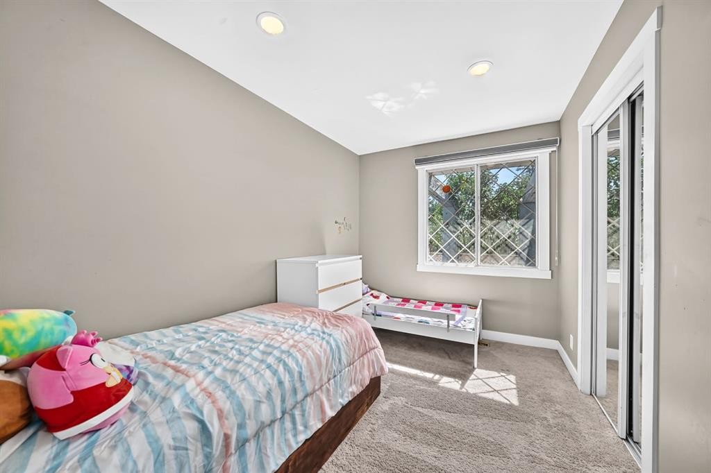 2203 65 Street Ne, Calgary, AB - Indoor Photo Showing Bedroom