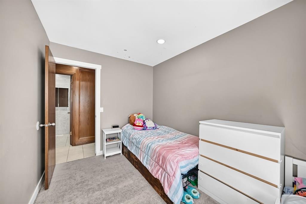 2203 65 Street Ne, Calgary, AB - Indoor Photo Showing Bedroom