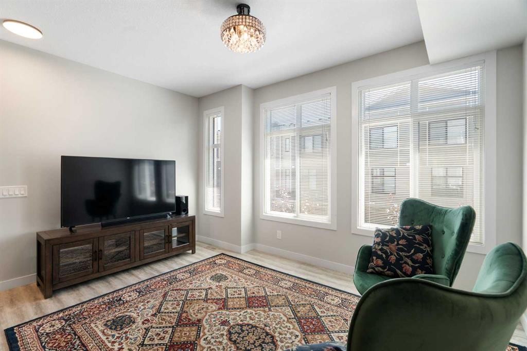 28-138 Seton Passage Se, Calgary, AB - Indoor Photo Showing Living Room
