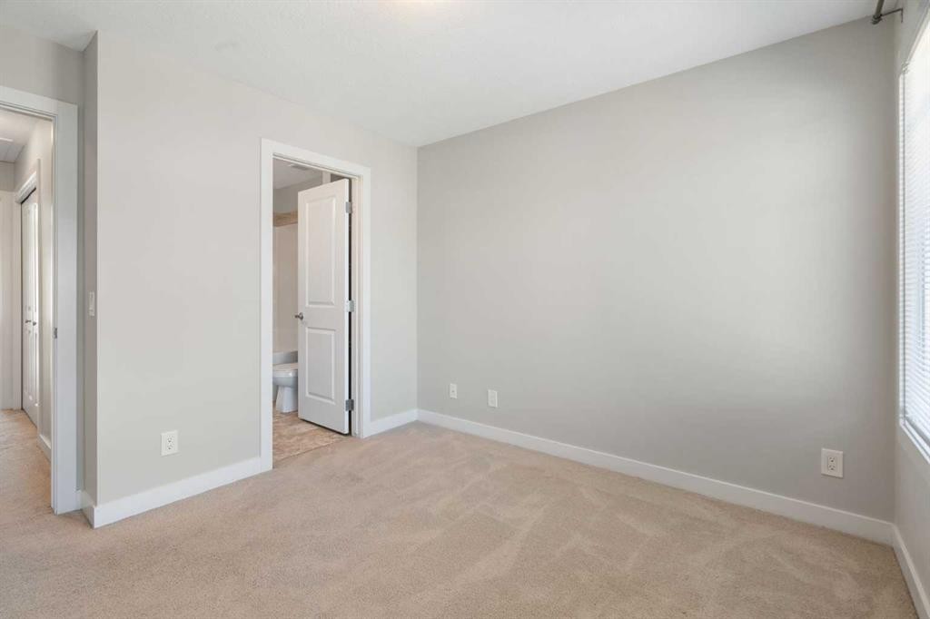 28-138 Seton Passage Se, Calgary, AB - Indoor Photo Showing Other Room