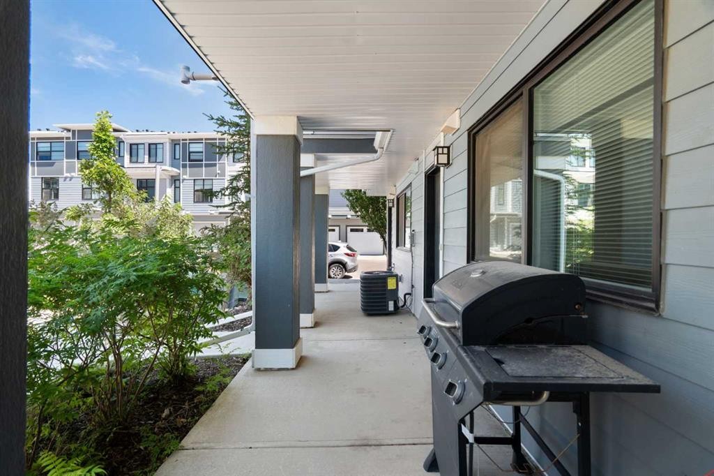 28-138 Seton Passage Se, Calgary, AB - Outdoor With Balcony With Exterior