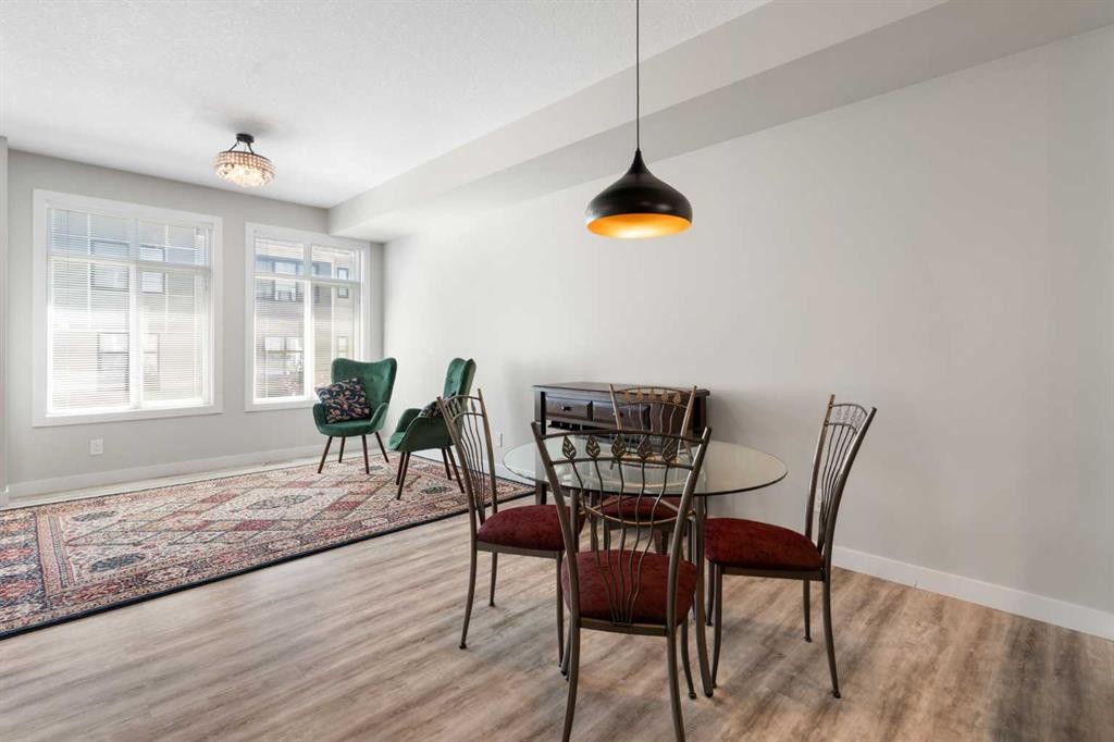 28-138 Seton Passage Se, Calgary, AB - Indoor Photo Showing Dining Room