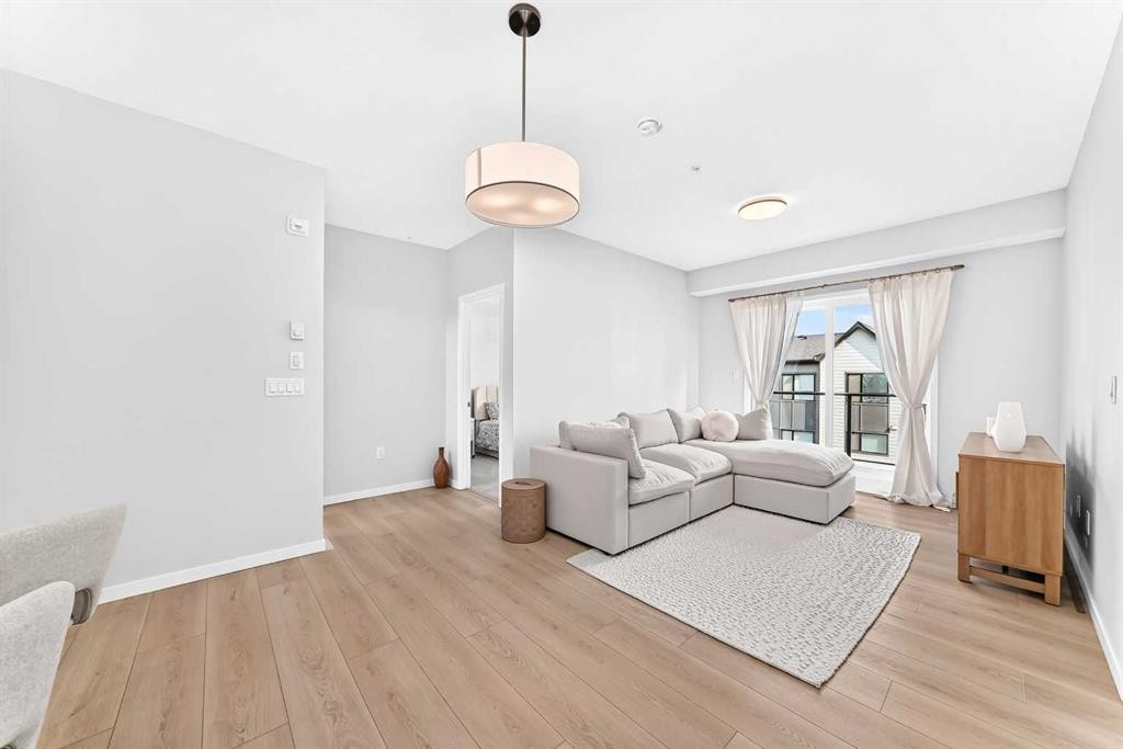 6301-20295 Seton Way Se, Calgary, AB - Indoor Photo Showing Living Room