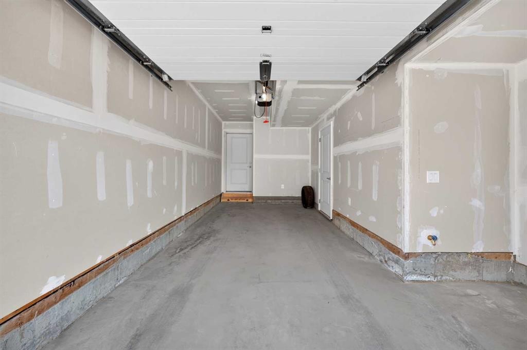 363-301 Redstone Boulevard Ne, Calgary, AB - Indoor Photo Showing Garage