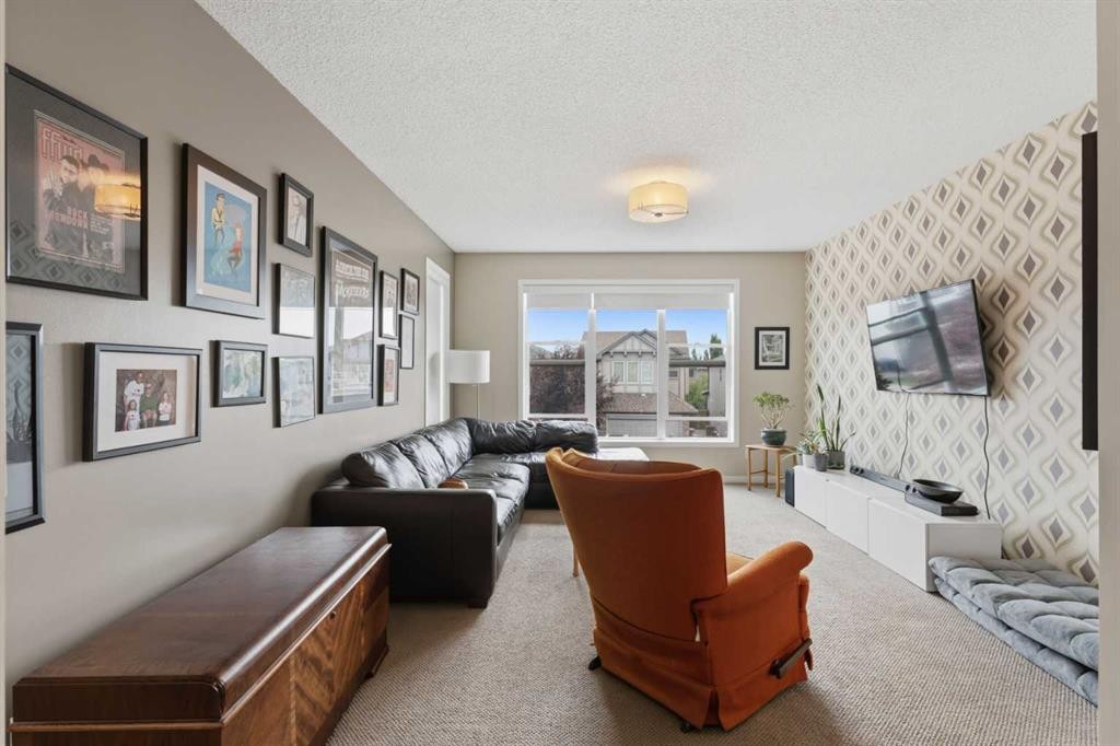 48 Brightoncrest Manor Se, Calgary, AB - Indoor Photo Showing Living Room
