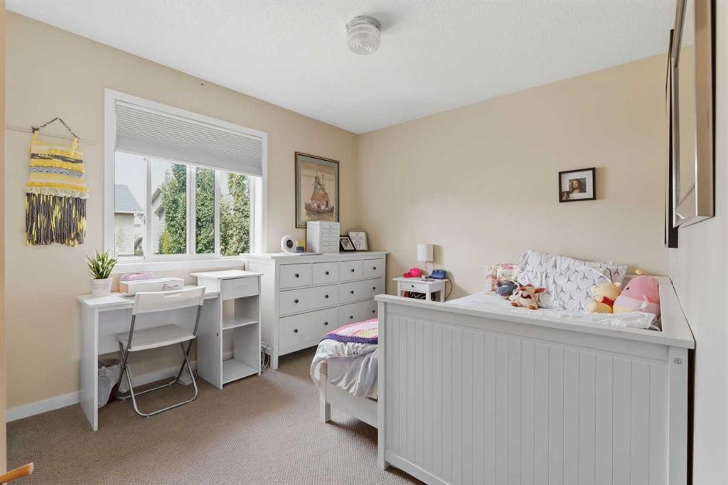 48 Brightoncrest Manor Se, Calgary, AB - Indoor Photo Showing Bedroom