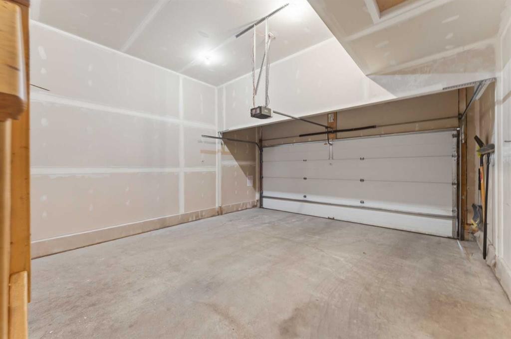 48 Brightoncrest Manor Se, Calgary, AB - Indoor Photo Showing Garage