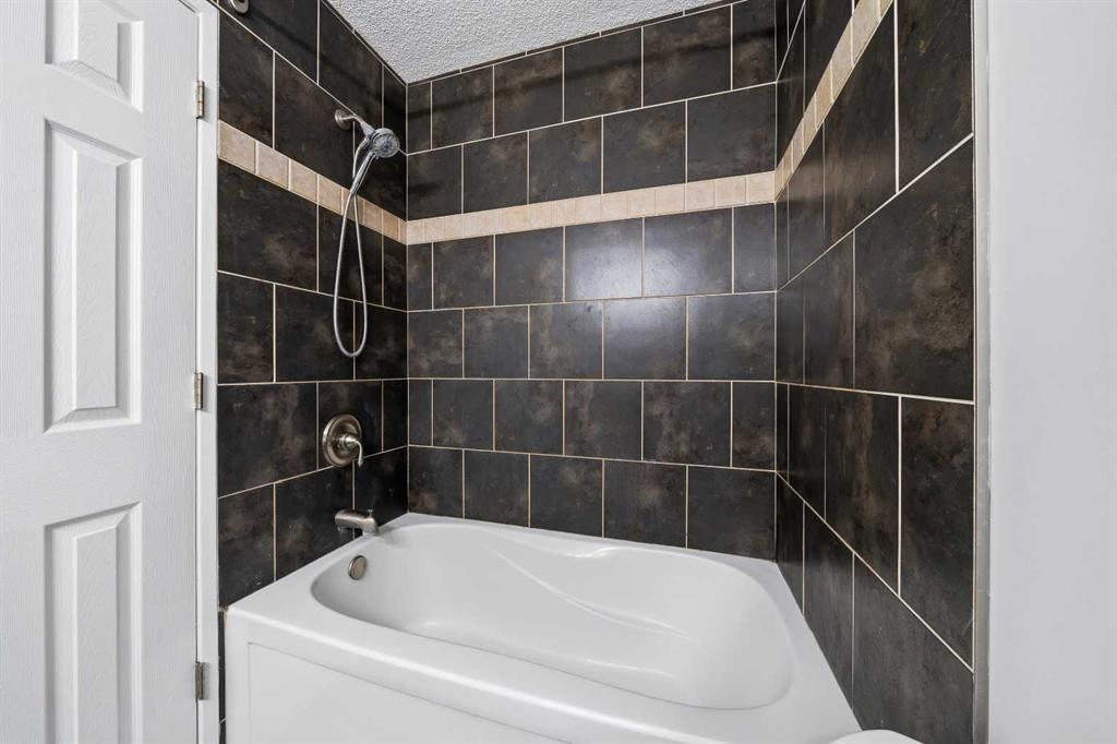 154 Midbend Place Se, Calgary, AB - Indoor Photo Showing Bathroom