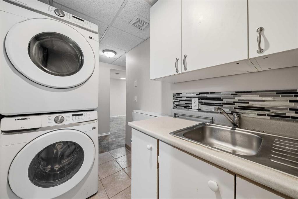 154 Midbend Place Se, Calgary, AB - Indoor Photo Showing Laundry Room