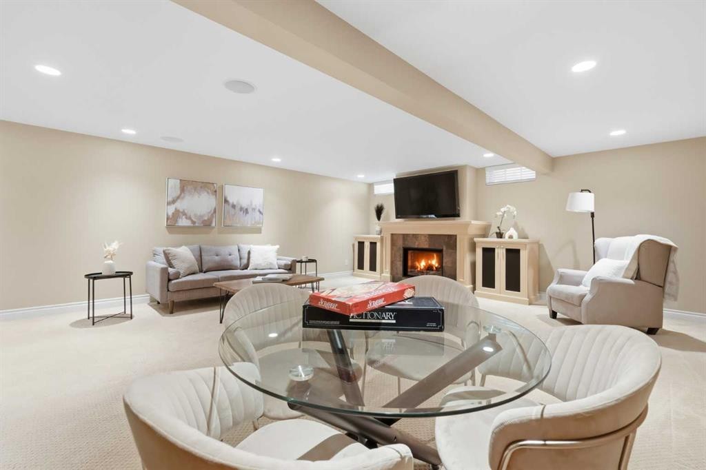 604 Willoughby Crescent Se, Calgary, AB - Indoor Photo Showing Living Room With Fireplace
