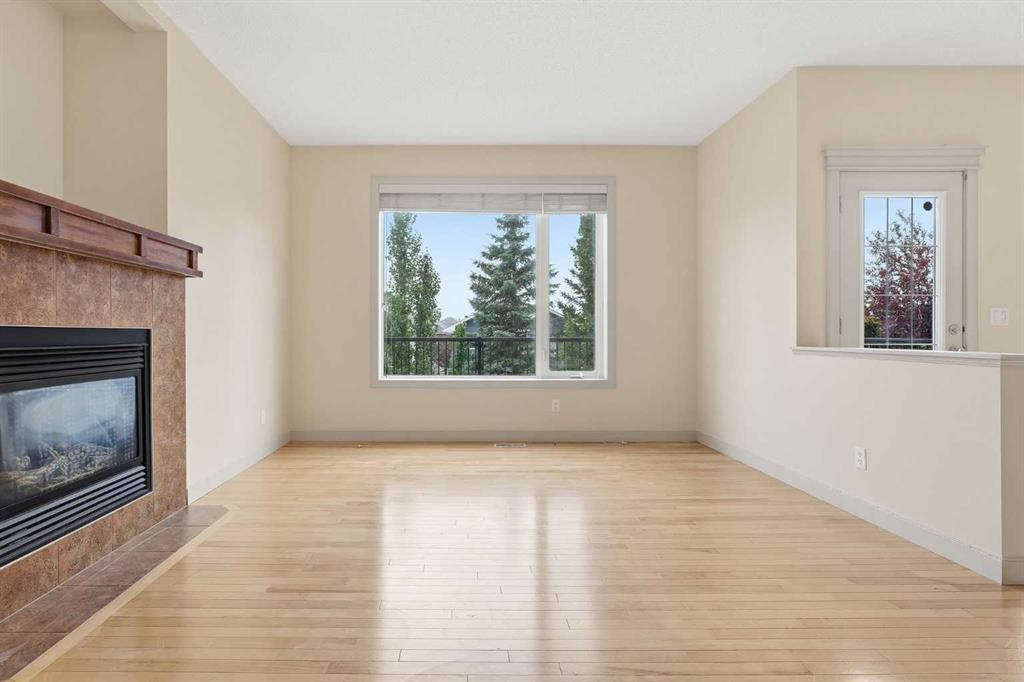 47 Evanspark Circle, Calgary, AB - Indoor Photo Showing Living Room With Fireplace