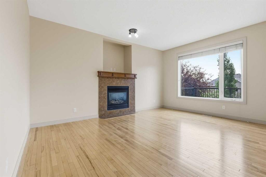 47 Evanspark Circle, Calgary, AB - Indoor Photo Showing Living Room With Fireplace