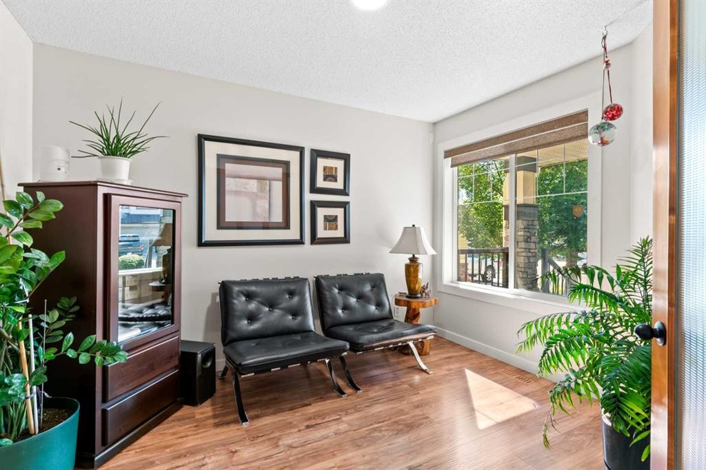 114 Chapalina Terrace Se, Calgary, AB - Indoor Photo Showing Living Room
