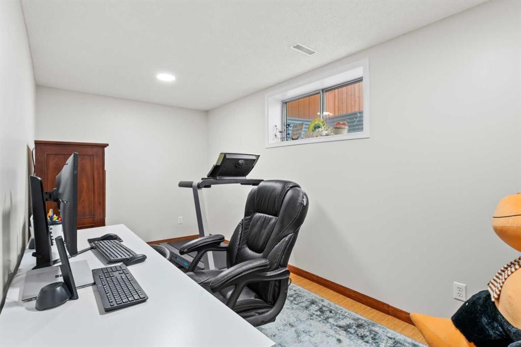 114 Chapalina Terrace Se, Calgary, AB - Indoor Photo Showing Gym Room