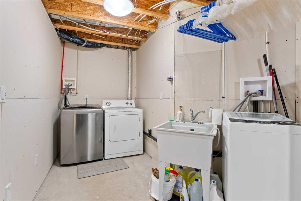 114 Chapalina Terrace Se, Calgary, AB - Indoor Photo Showing Laundry Room