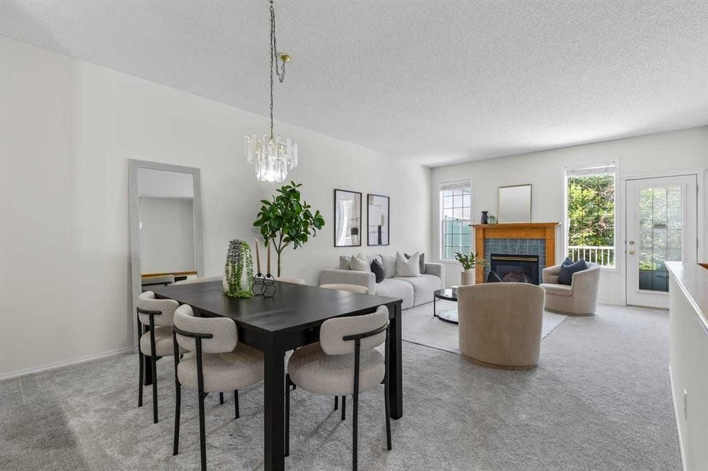 139 Hidden Valley Green Nw, Calgary, AB - Indoor With Fireplace