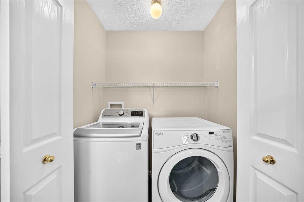 43 Somerside Common Sw, Calgary, AB - Indoor Photo Showing Laundry Room