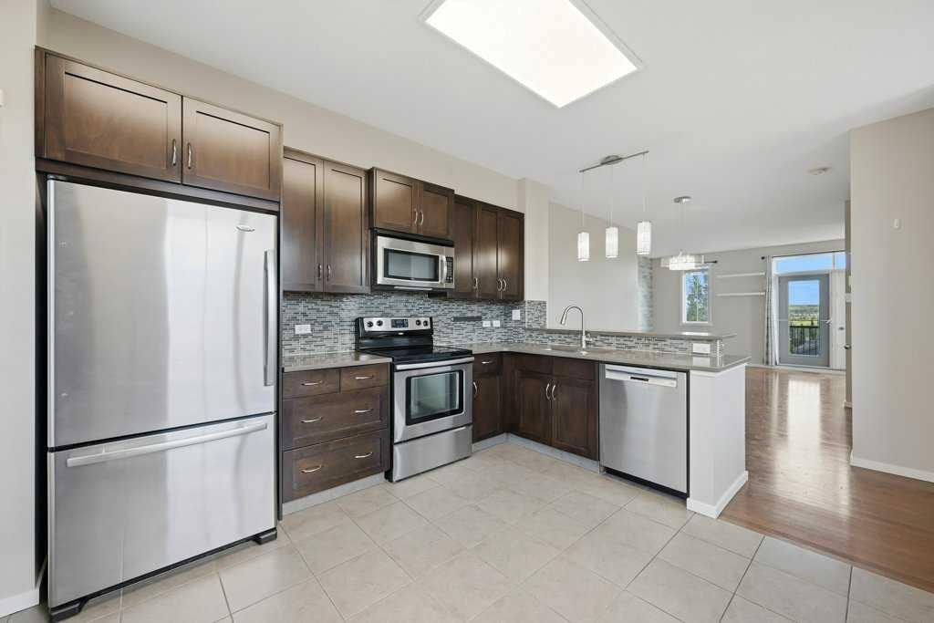 3 Evansview Gardens Nw, Calgary, AB - Indoor Photo Showing Kitchen With Stainless Steel Kitchen With Upgraded Kitchen