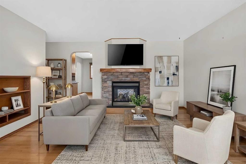 4639 Marbank Drive, Calgary, AB - Indoor Photo Showing Living Room With Fireplace