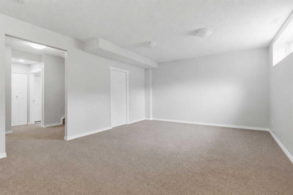26 Evansfield Park Nw, Calgary, AB - Indoor Photo Showing Other Room