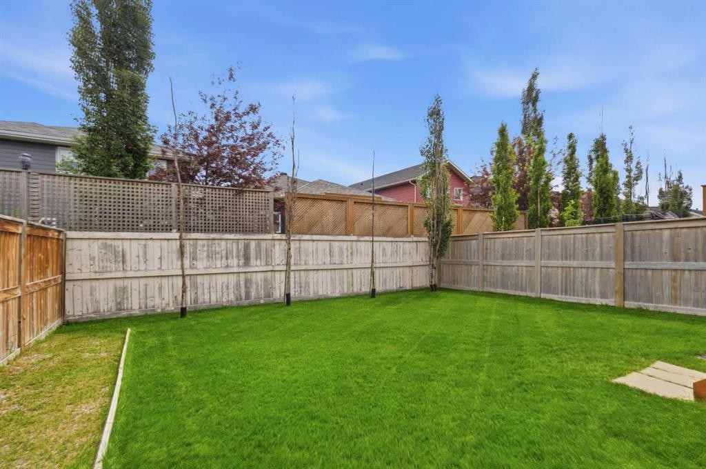 26 Evansfield Park Nw, Calgary, AB - Outdoor With Backyard