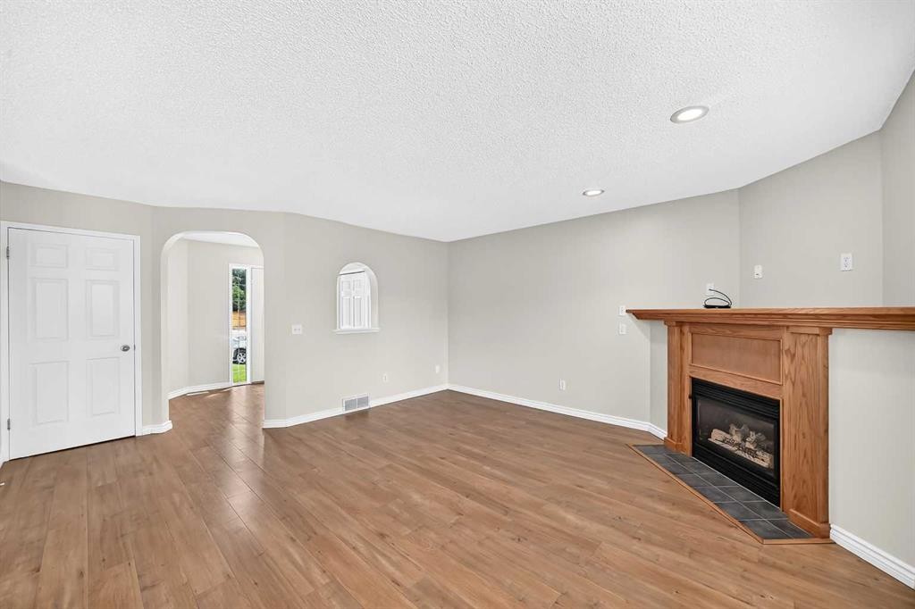247 Covington Close Ne, Calgary, AB - Indoor With Fireplace
