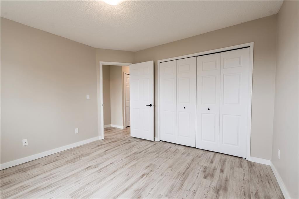 1019 Smith Avenue, Crossfield, AB - Indoor Photo Showing Other Room