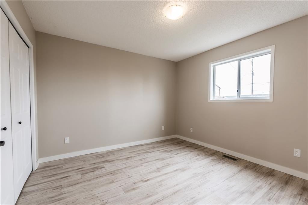 1019 Smith Avenue, Crossfield, AB - Indoor Photo Showing Other Room