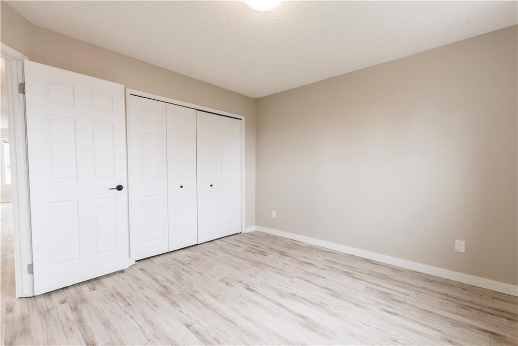 1019 Smith Avenue, Crossfield, AB - Indoor Photo Showing Other Room