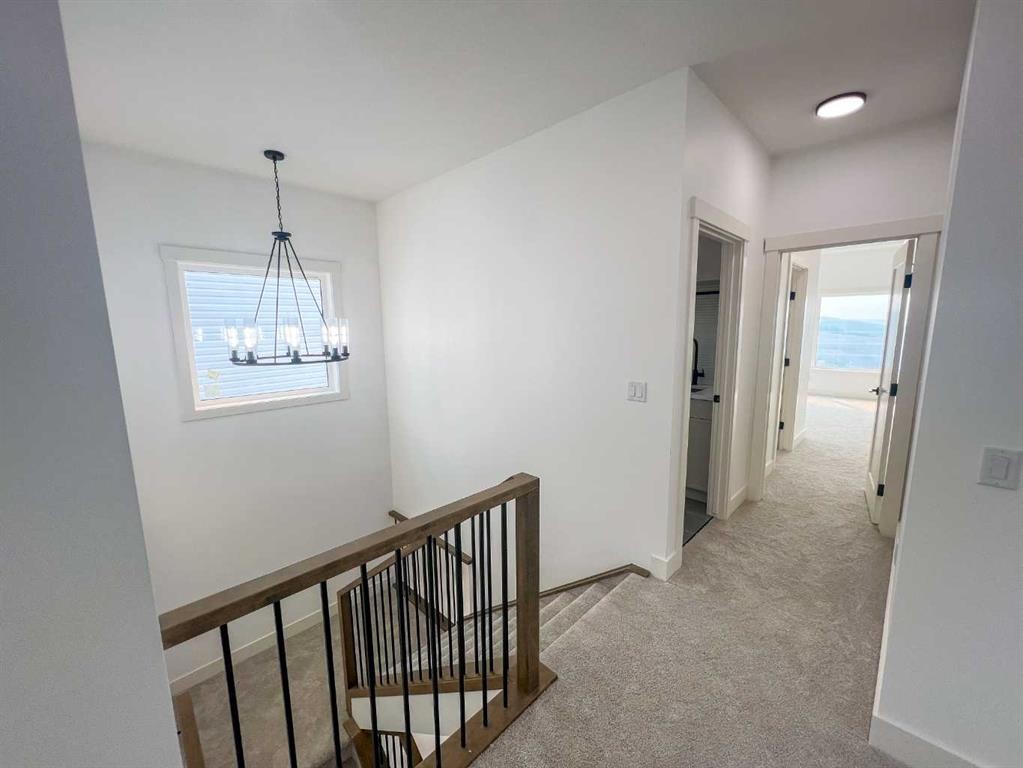 39 Heritage Ridge, Cochrane, AB - Indoor Photo Showing Other Room