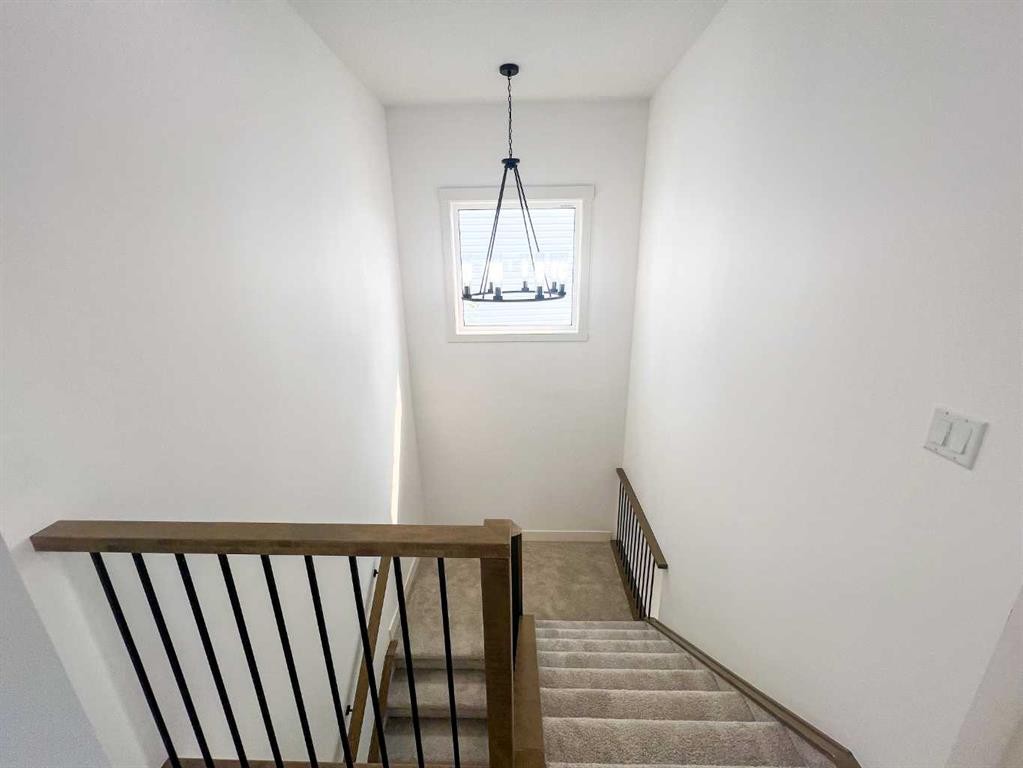 39 Heritage Ridge, Cochrane, AB - Indoor Photo Showing Other Room