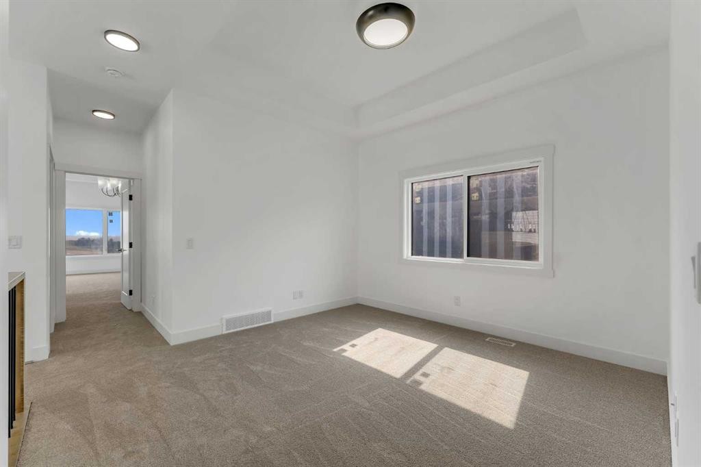 39 Heritage Ridge, Cochrane, AB - Indoor Photo Showing Other Room