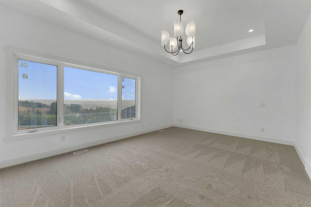 39 Heritage Ridge, Cochrane, AB - Indoor Photo Showing Other Room