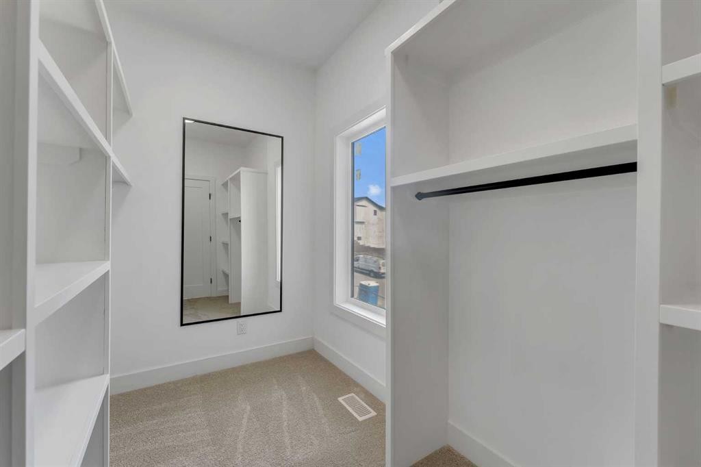 39 Heritage Ridge, Cochrane, AB - Indoor Photo Showing Other Room