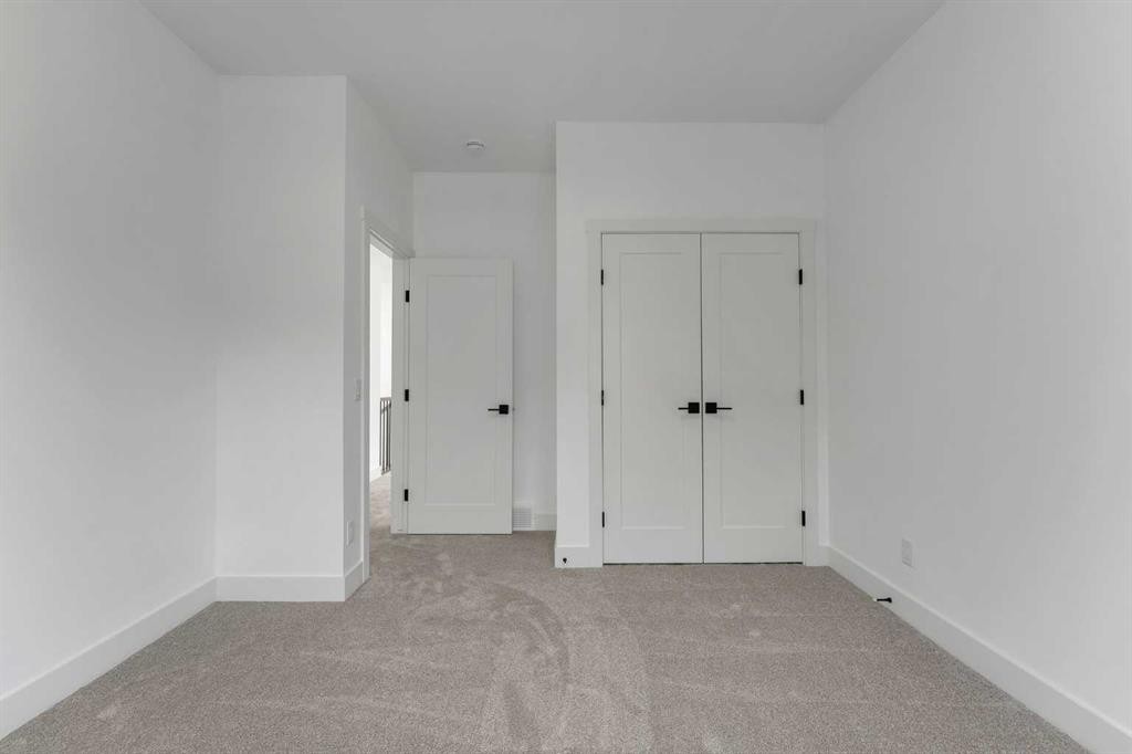 39 Heritage Ridge, Cochrane, AB - Indoor Photo Showing Other Room