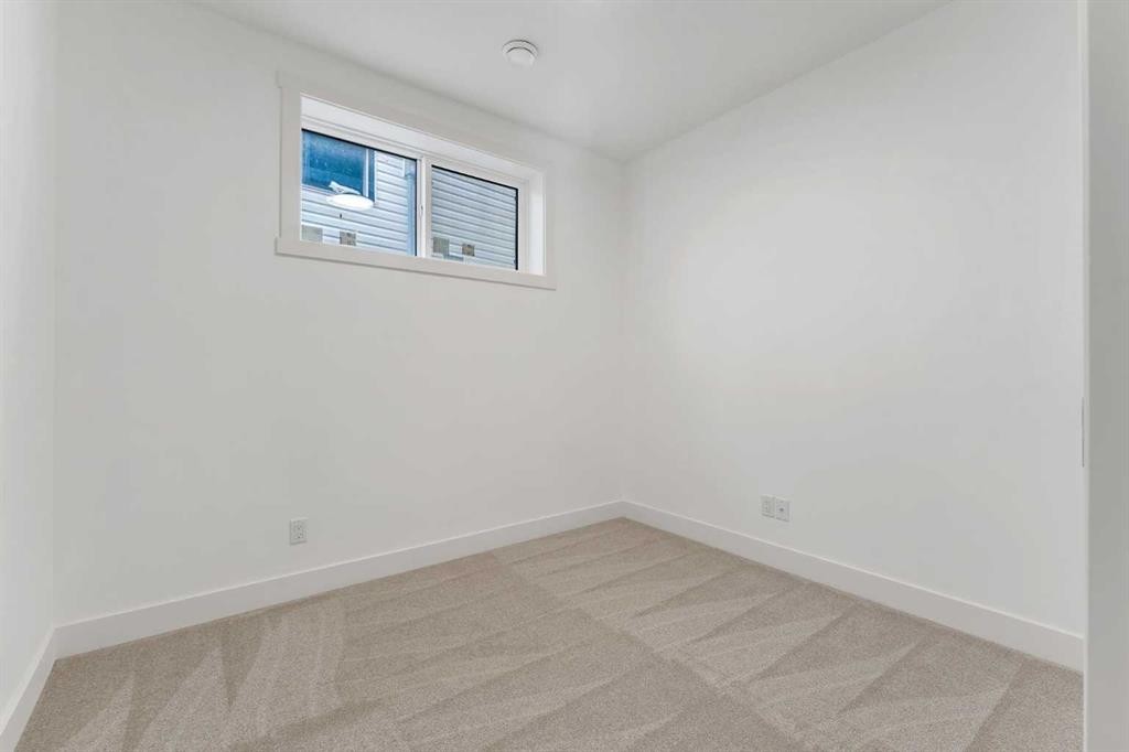 39 Heritage Ridge, Cochrane, AB - Indoor Photo Showing Other Room