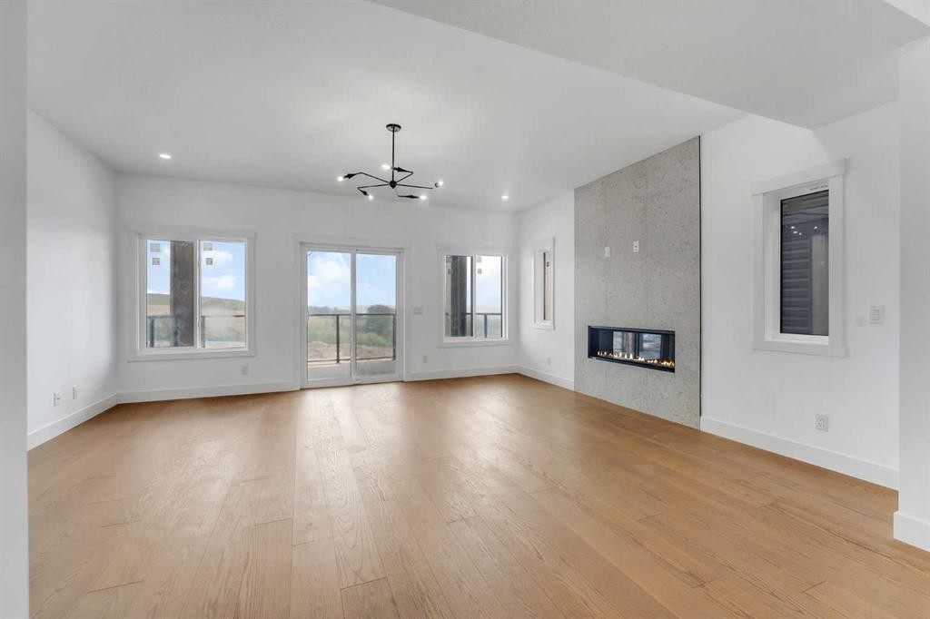 39 Heritage Ridge, Cochrane, AB - Indoor With Fireplace