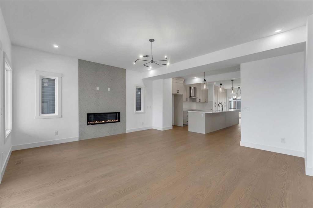 39 Heritage Ridge, Cochrane, AB - Indoor With Fireplace