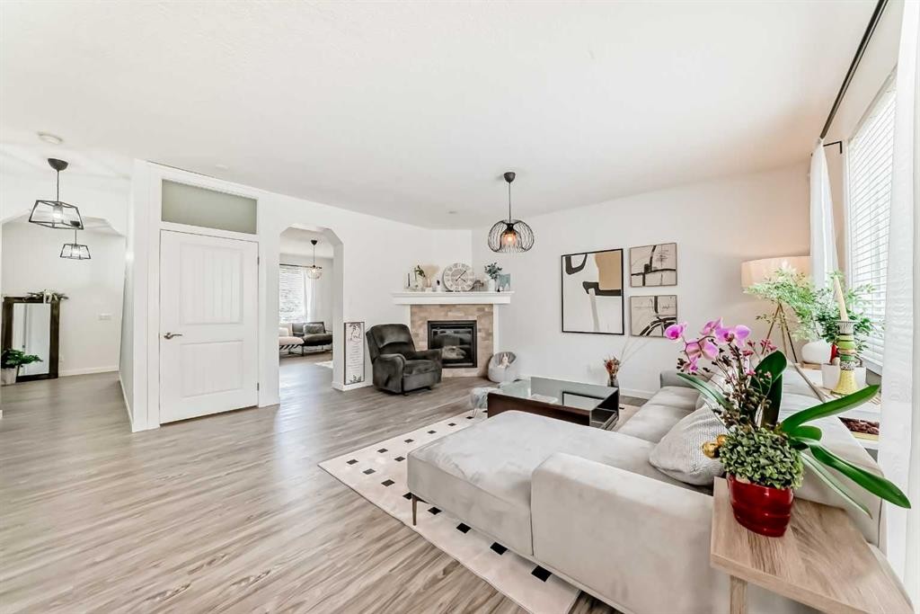 169 Aspenshire Drive Sw, Calgary, AB - Indoor Photo Showing Living Room With Fireplace