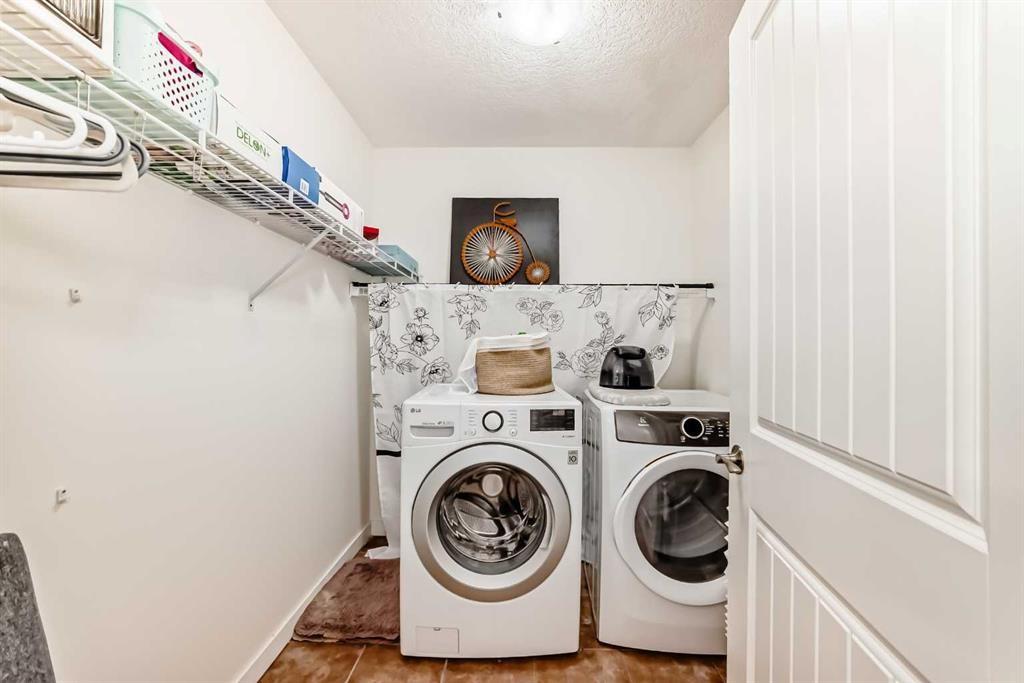 169 Aspenshire Drive Sw, Calgary, AB - Indoor Photo Showing Laundry Room