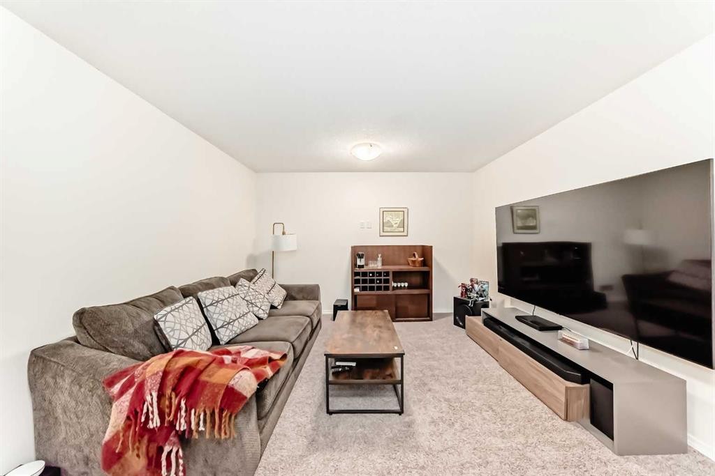 169 Aspenshire Drive Sw, Calgary, AB - Indoor Photo Showing Living Room
