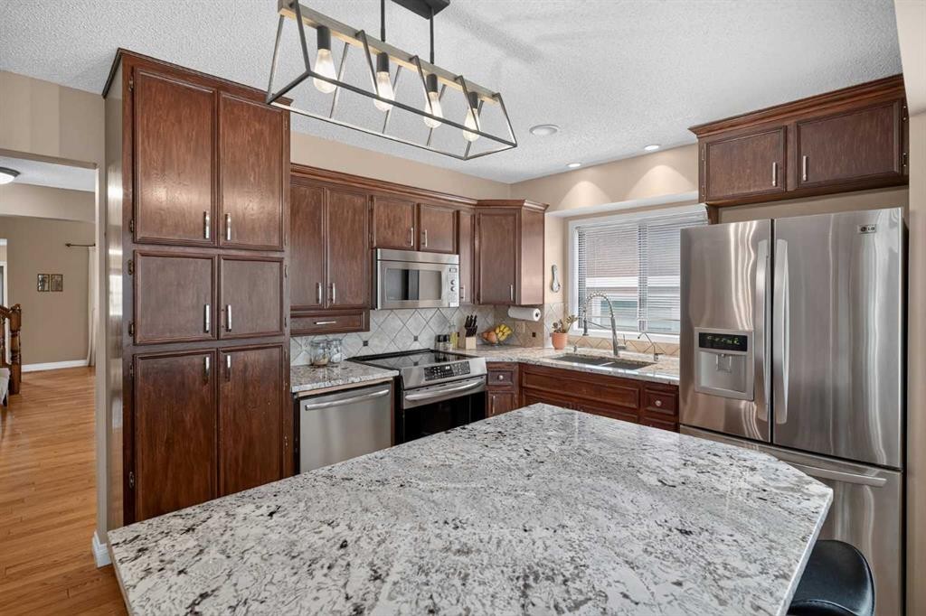 80 Hawkhill Way Nw, Calgary, AB - Indoor Photo Showing Kitchen With Stainless Steel Kitchen With Double Sink