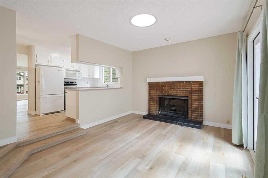1111 Berkley Drive Nw, Calgary, AB - Indoor With Fireplace