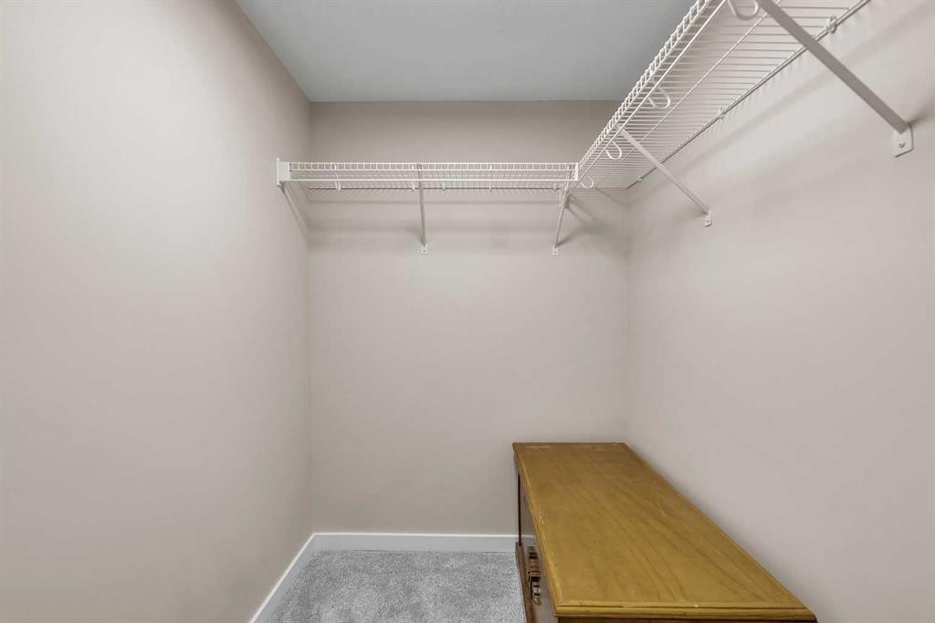 7 Emberside Park, Cochrane, AB - Indoor With Storage