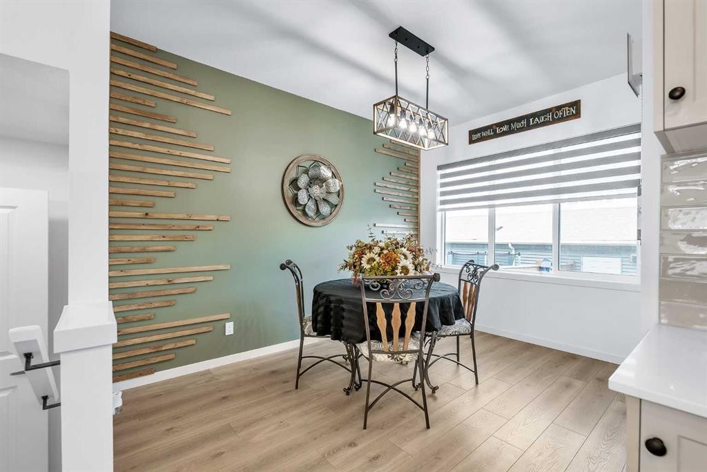 7 Emberside Park, Cochrane, AB - Indoor Photo Showing Dining Room