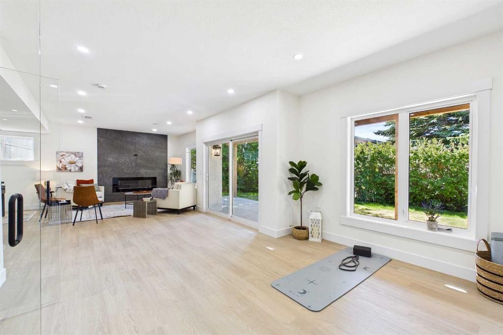 16 Edcath Mews Nw, Calgary, AB - Indoor With Fireplace