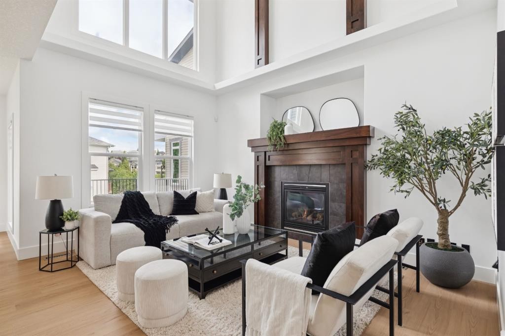 40 Val Gardena Court Sw, Calgary, AB - Indoor Photo Showing Living Room With Fireplace