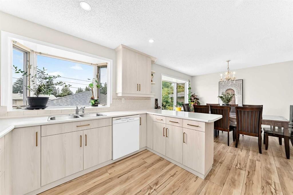 4 Marbrooke Circle Ne, Calgary, AB - Indoor Photo Showing Kitchen With Double Sink