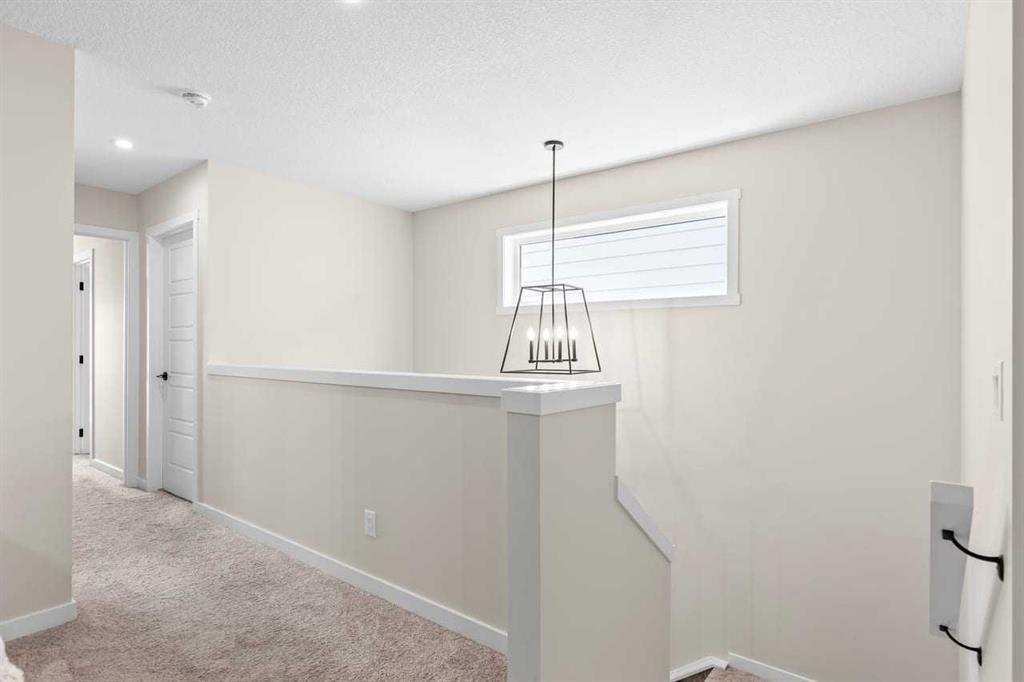 45 Savoy Landing Se, Calgary, AB - Indoor Photo Showing Other Room