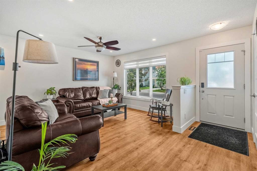 173 Windstone Link Sw, Airdrie, AB - Indoor Photo Showing Living Room
